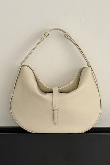 Ivory MIULIN Shellie Hobo Bag with shoulder strap and textured surface, stylish and versatile accessory for everyday use.