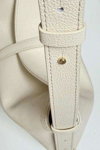 Ivory MIULIN Shellie Hobo Bag with soft leather and slouchy design, featuring a spacious interior and stylish shoulder strap.