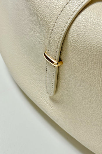 Ivory Shellie Hobo Bag by MIULIN, featuring soft leather and a relaxed, slouchy design with a spacious interior and shoulder strap.