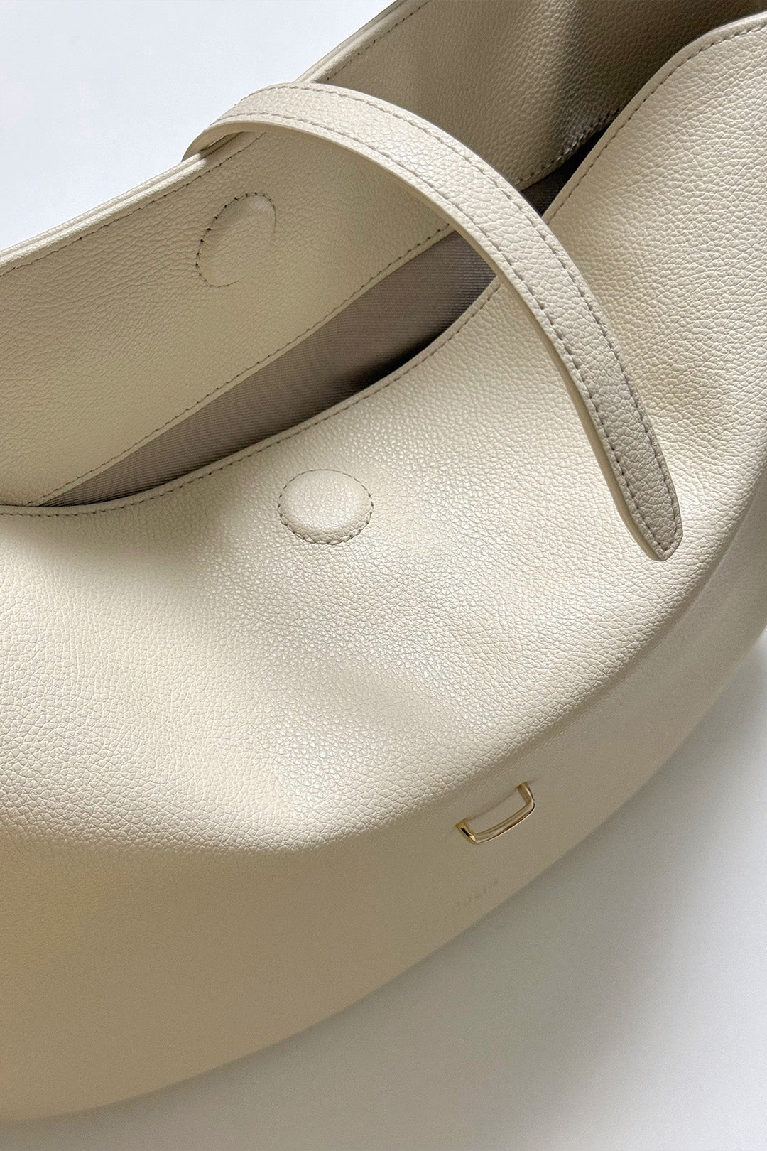 MIULIN Shellie Hobo Bag in ivory with soft leather, featuring a slouchy design and adjustable shoulder strap.