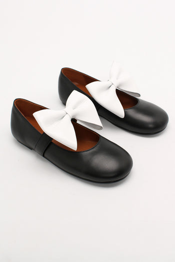 Finoacinque Soo Bow Mary Jane flat shoes in black and white with bow detail, featuring a classic slip-on design and rounded toe.