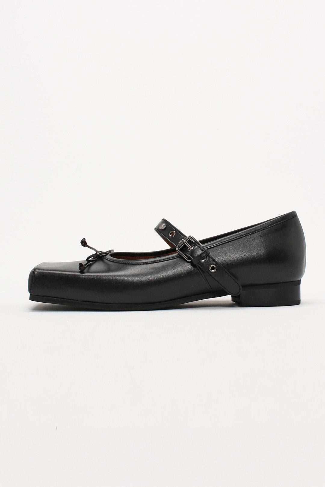 Black Tina Strap flat shoes by Finoacinque, featuring a sleek design with ankle straps and comfortable flat sole.