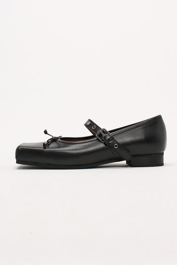 Black Tina Strap flat shoes by Finoacinque, featuring a sleek design with ankle straps and comfortable flat sole.