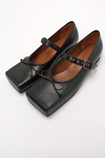 Black Tina Strap Flat Shoes by Finoacinque featuring a sleek design with comfortable straps and a flat sole.