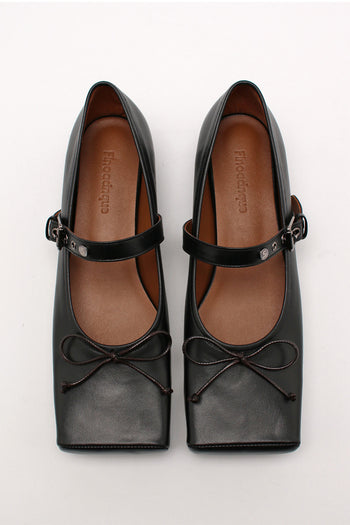 Black Tina Strap flat shoes by Finoacinque featuring a sleek design and comfortable flat sole.