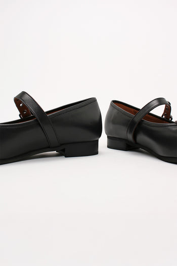 Black Tina Strap Flat Shoes by Finoacinque featuring a sleek design and comfortable flat sole, shown from a side view.