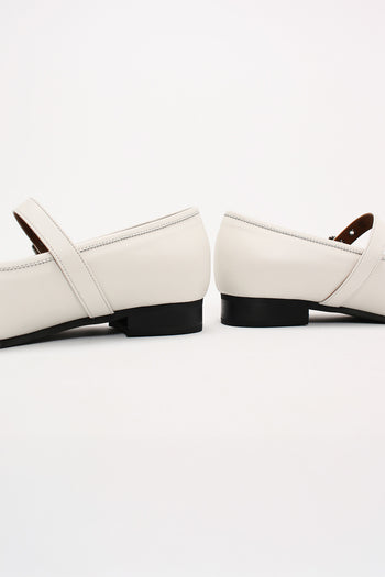 Ivory Tina Strap Flat Shoes by Finoacinque with ankle straps and a sleek, minimalist design for casual or dressy occasions.