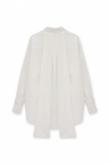 White Ribbon Back Shirt by EUNJO featuring a stylish ribbon detail on the back, made from soft, comfortable fabric.