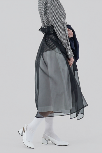 Black Charlock No-Bang See-Through Skirt by Ahhorn, lightweight and sheer bottoms with a stylish, see-through design.
