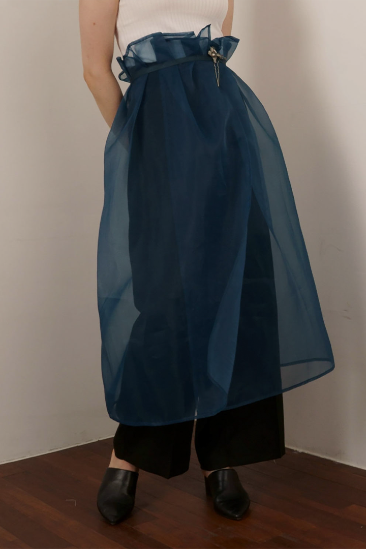 Black Charlock No-Bang See-Through Skirt by Ahhorn, lightweight and sheer, designed as stylish bottoms for modern fashion.