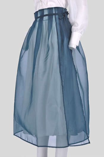 Black Charlock No-Bang See-Through Skirt by Ahhorn, lightweight and sheer, showcasing its flowy bottom design.