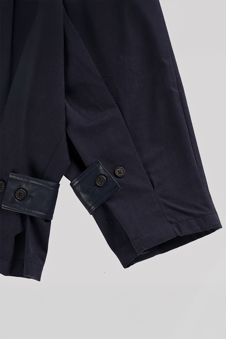 Ahhorn Peach Balloon Double Wide Trousers, navy bottoms with loose fit and balloon design, displayed on a model.