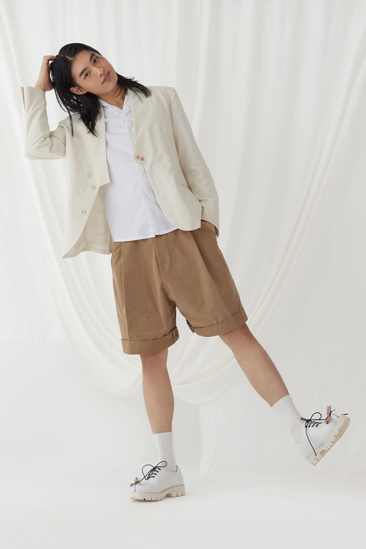 White Peach Balloon Double Wide Half Shorts by Ahhorn, comfortable bottoms with a relaxed fit and stylish design.