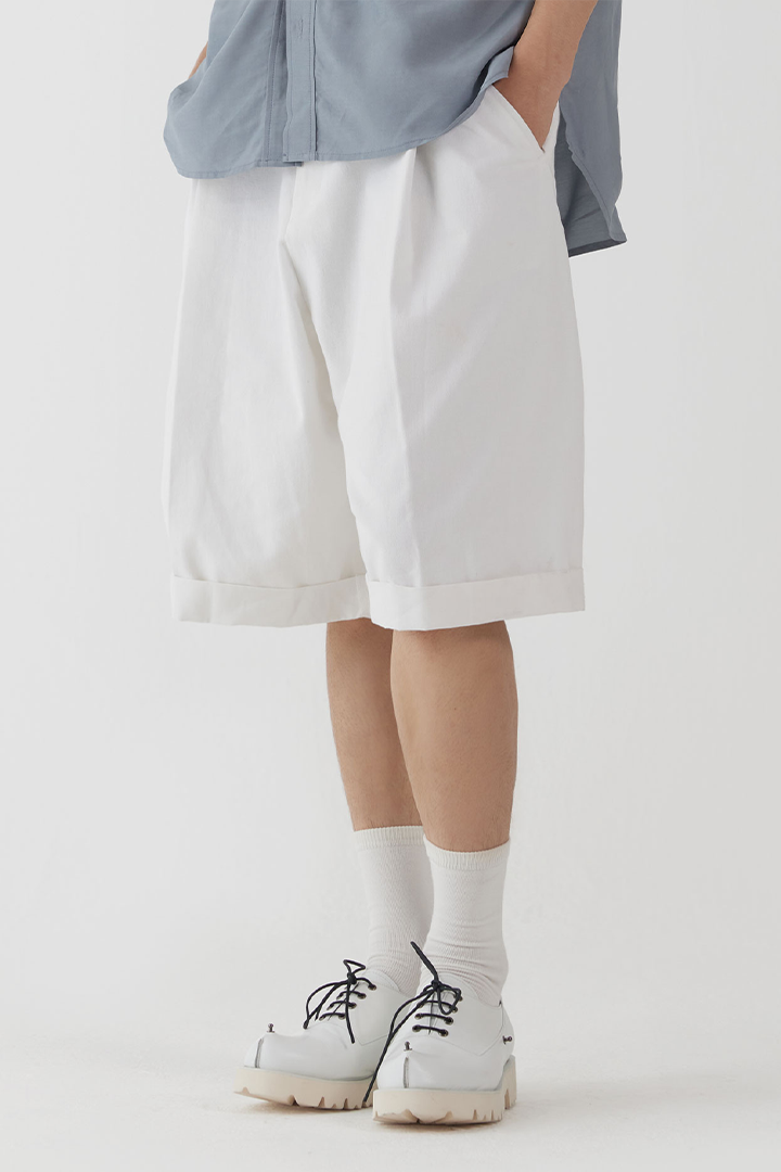 White Peach Balloon Double Wide Half Shorts by Ahhorn, stylish bottoms with a relaxed fit and comfortable design.