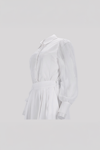 Black tile-shaped curved chiffon blouse from Ahhorn, stylish shirt with unique geometric design and flowing fabric.
