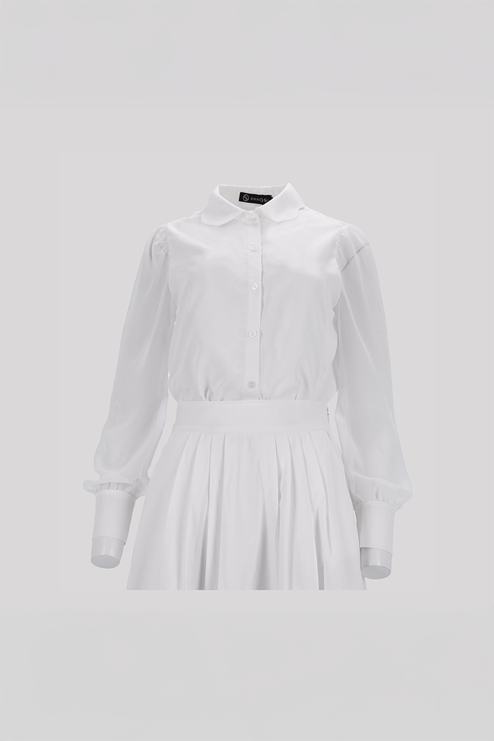 Black tile-shaped curved chiffon blouse from Ahhorn, featuring a stylish shirt design with a relaxed fit.