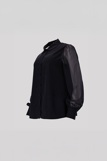 Black tile-shaped curved chiffon blouse from Ahhorn, stylish shirt with flowing fabric and unique geometric pattern.