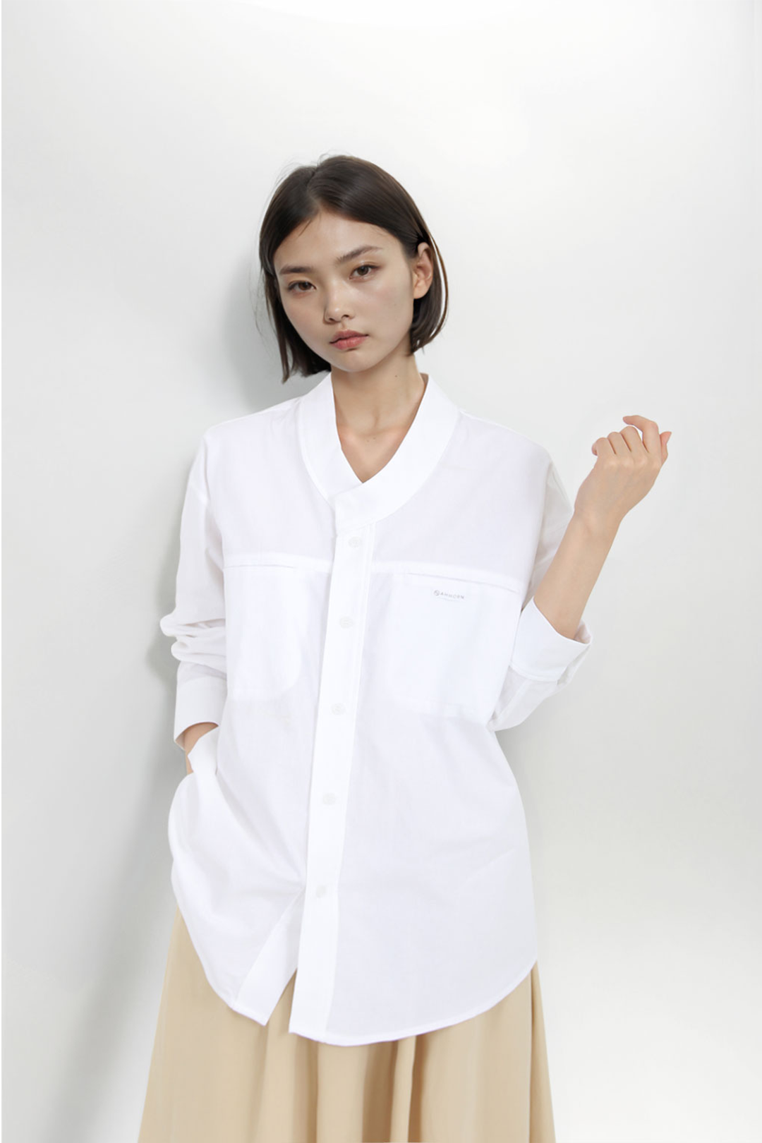 White women's casual hanbok Mokpan collar shirt by Ahhorn, featuring traditional-inspired design and comfortable fit.