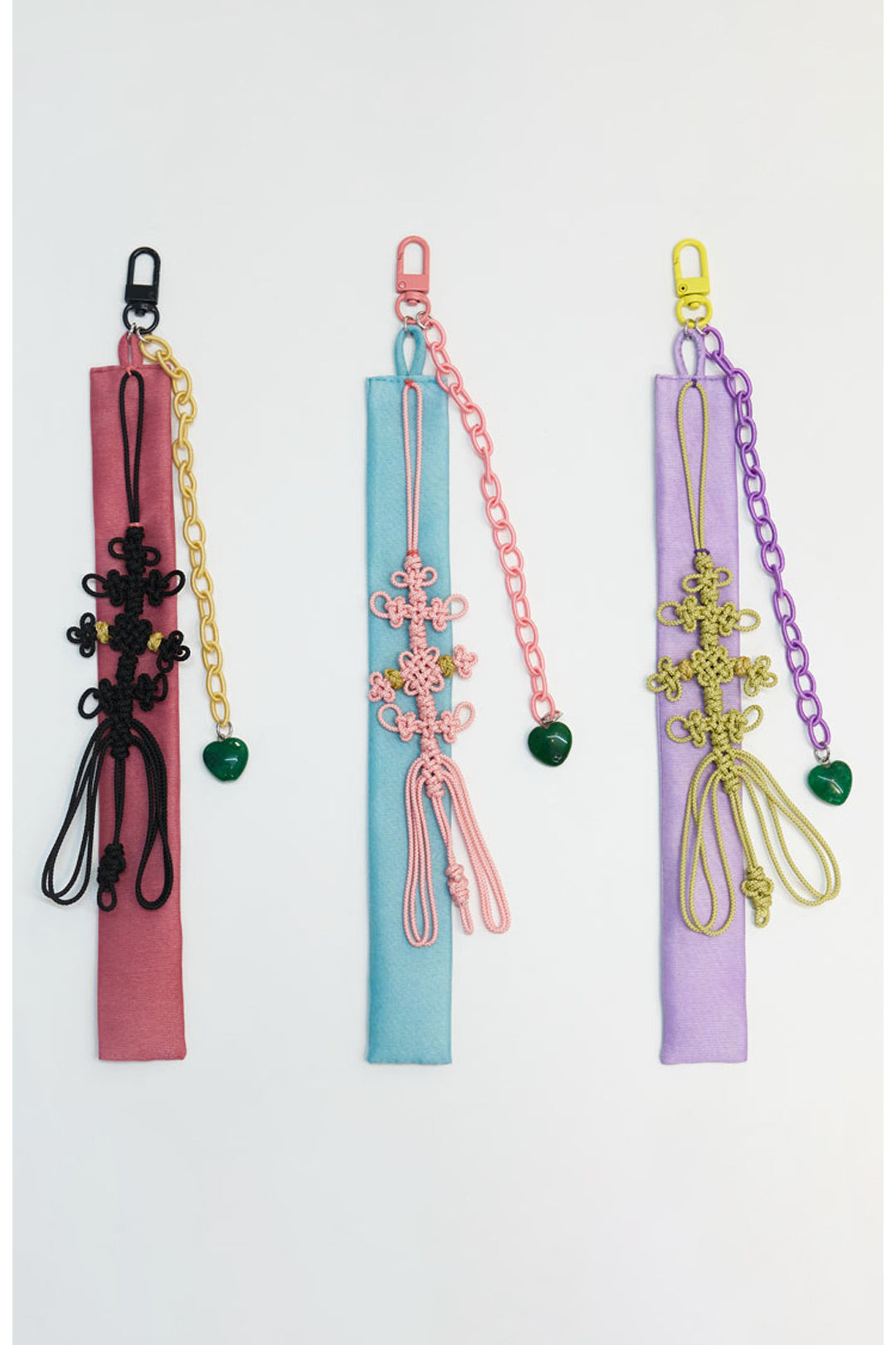 Red beaded knot keychain by CCOMAQUE, stylish accessories with intricate beaded design and durable keyring.