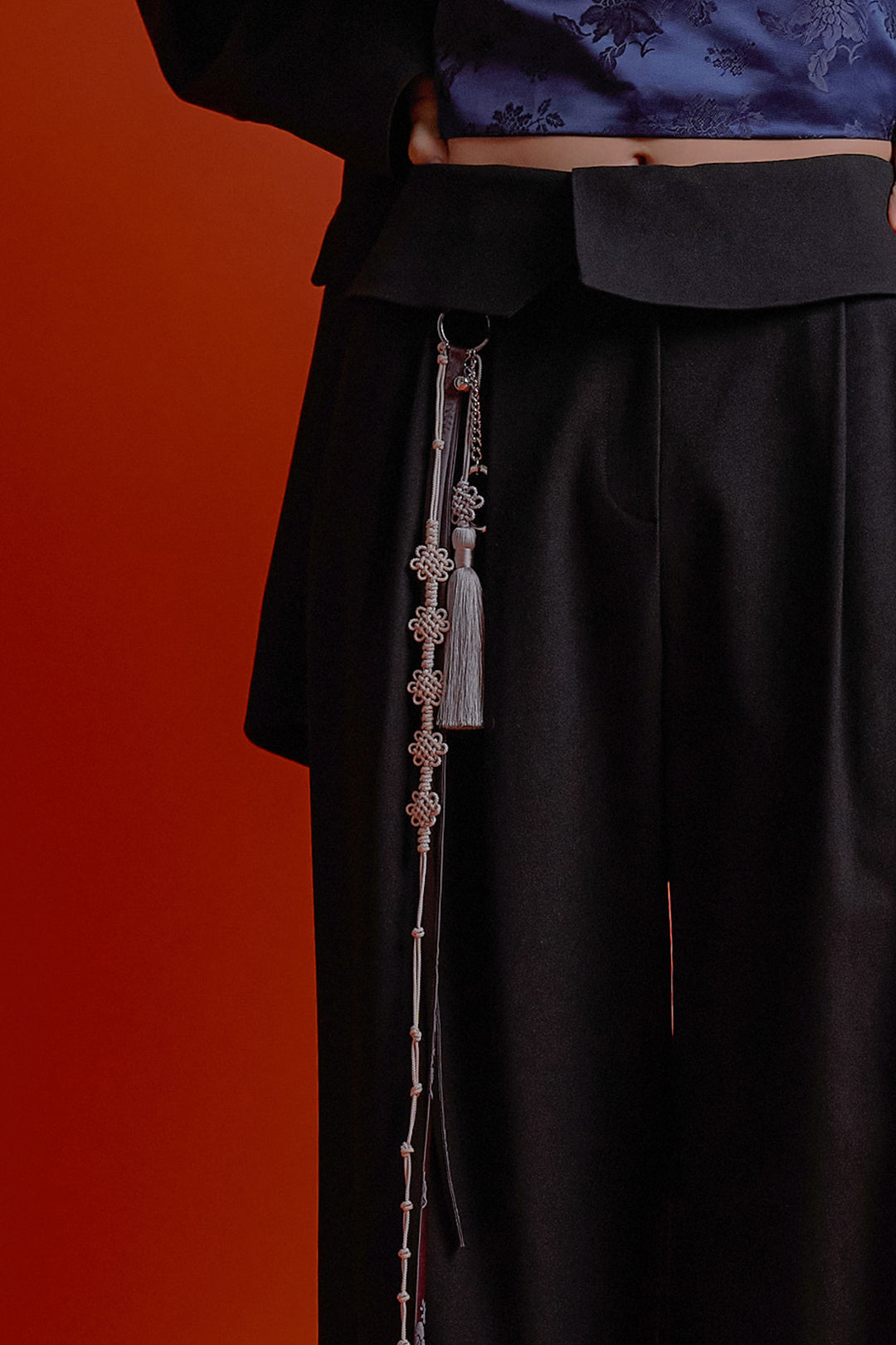 Black four-panel wrap pants from CCOMAQUE, stylish and comfortable bottoms with layered design.