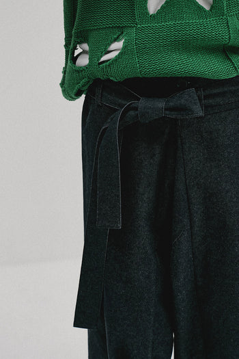 Ccomaque denim wide-leg pants for women, showcasing relaxed fit and classic blue denim fabric.