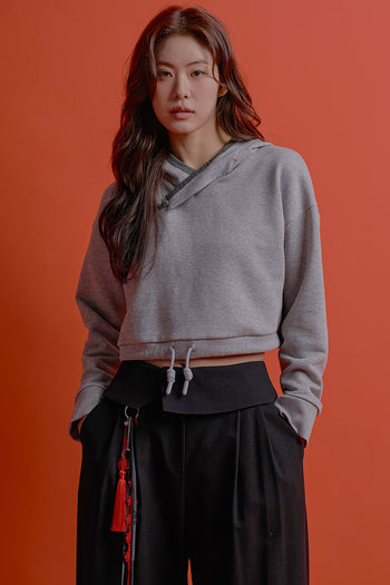 Black CCOMAQUE hoodie featuring a bold dragon emblem on the front, comfortable casual wear for fans of edgy fashion.
