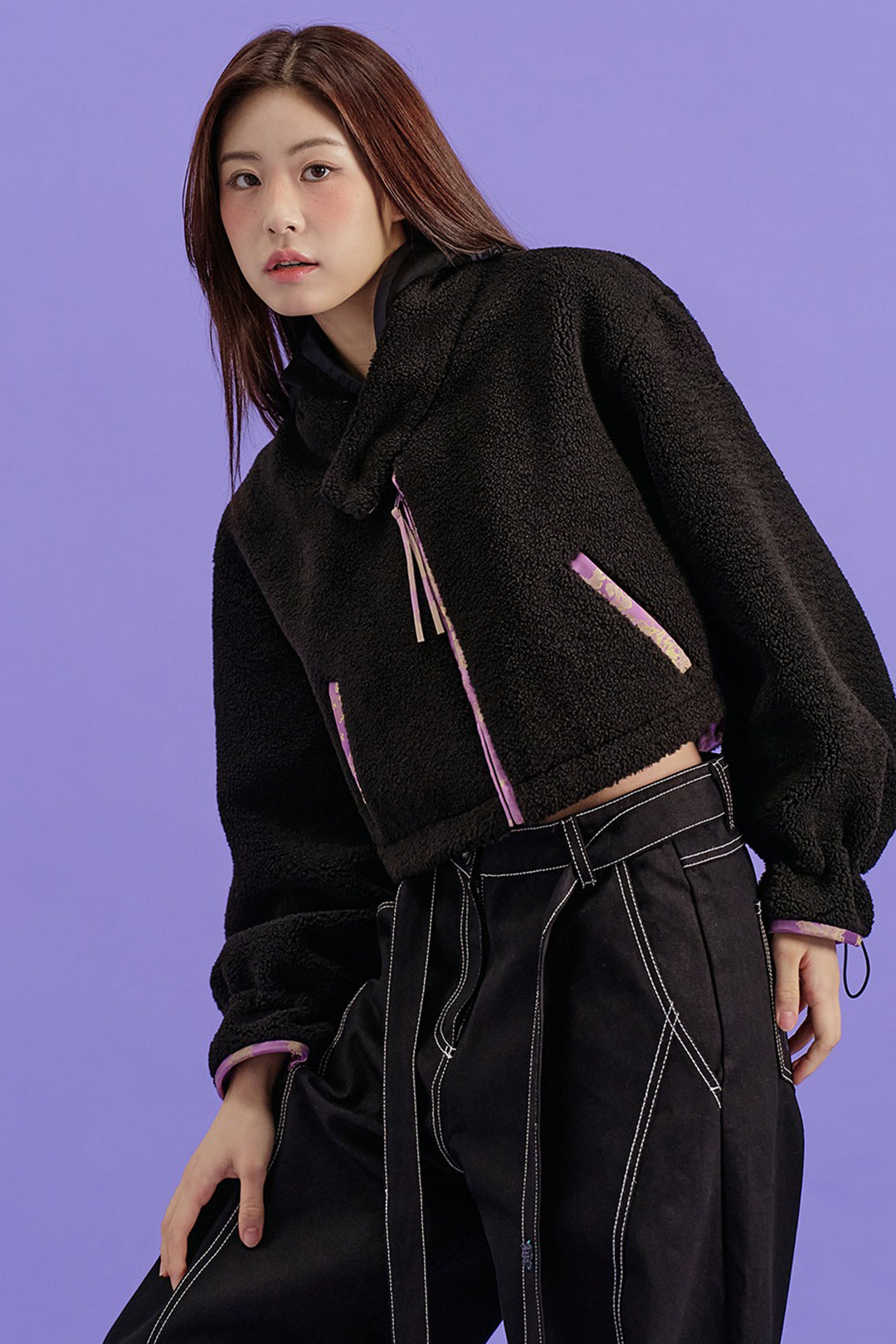 Black Gwimyeon pattern crop Jeogori jacket by CCOMAQUE, featuring traditional Korean design with a stylish, fitted silhouette.