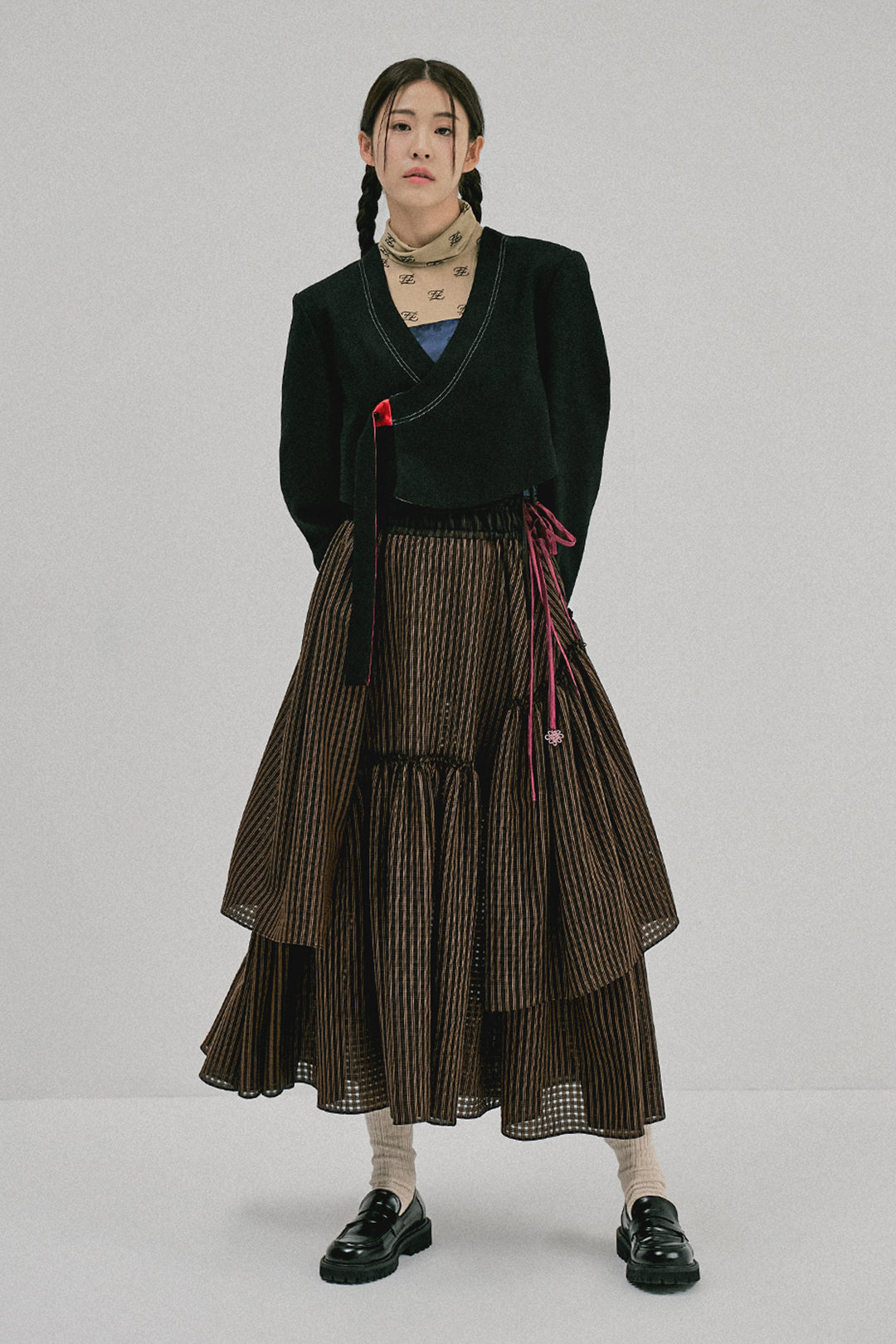 CCOMAQUE cropped stitch jacket featuring a stylish design, shown in a close-up of the one-size jacket with detailed stitching.