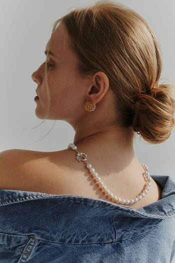 Chambriller Moonlight Ball Combi Earring showing a silver and moonlight-colored mixed metal earring with spherical design.