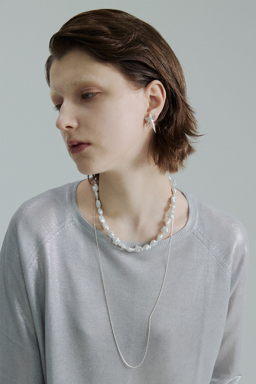 Silver Midnight White Earring by Chambriller featuring a sleek, elegant design with a polished finish.