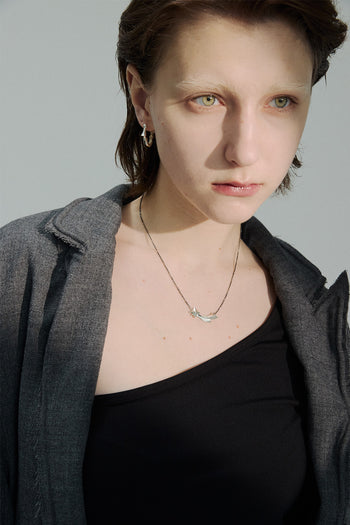 Chambriller silver streetlight earring with a sleek, modern design, showcasing its elegant, minimalist style and shiny finish.