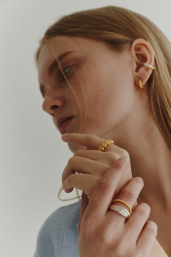 Chambriller Horizon Gold Ring with sleek band, showcasing a modern design in polished gold.