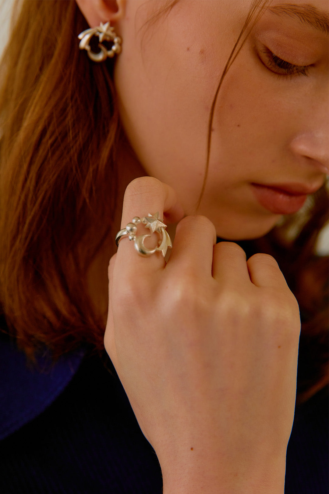 Chambriller silver ring with a celestial cosmos design, featuring intricate silver craftsmanship and a sleek band.