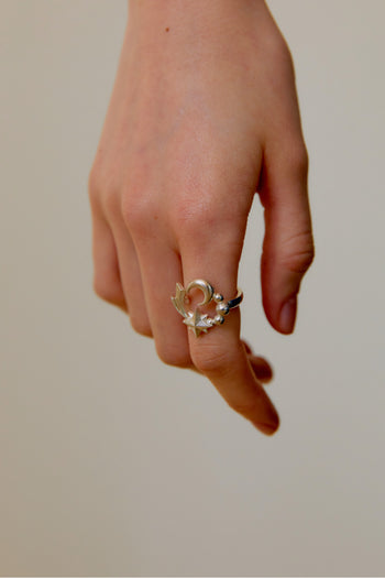 Chambriller Cosmos Silver Ring showing a sleek silver band with celestial-inspired design details.