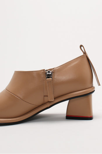 Beige Moon Short Boots by Finoacinque featuring a stylish ankle-high design and sleek silhouette.