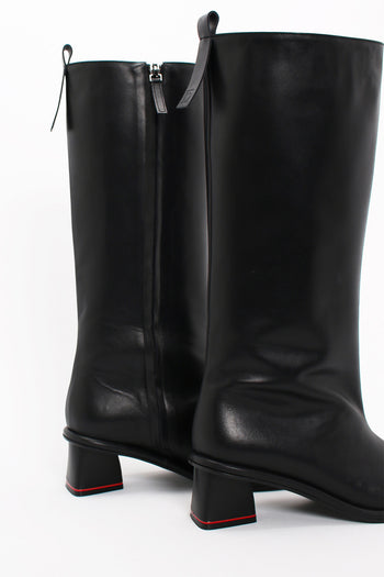 Black Moon Long Boots by Finoacinque featuring sleek design and knee-high length, made of smooth leather material.
