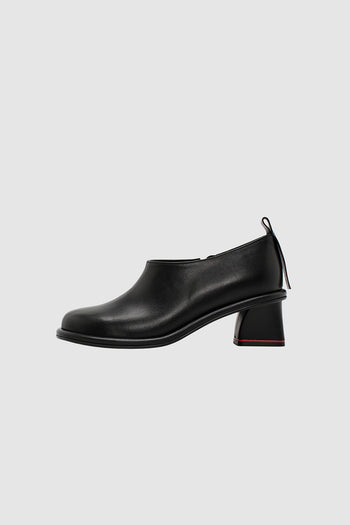 Black Moon Short Boots by Finoacinque featuring a sleek design and ankle-high silhouette.