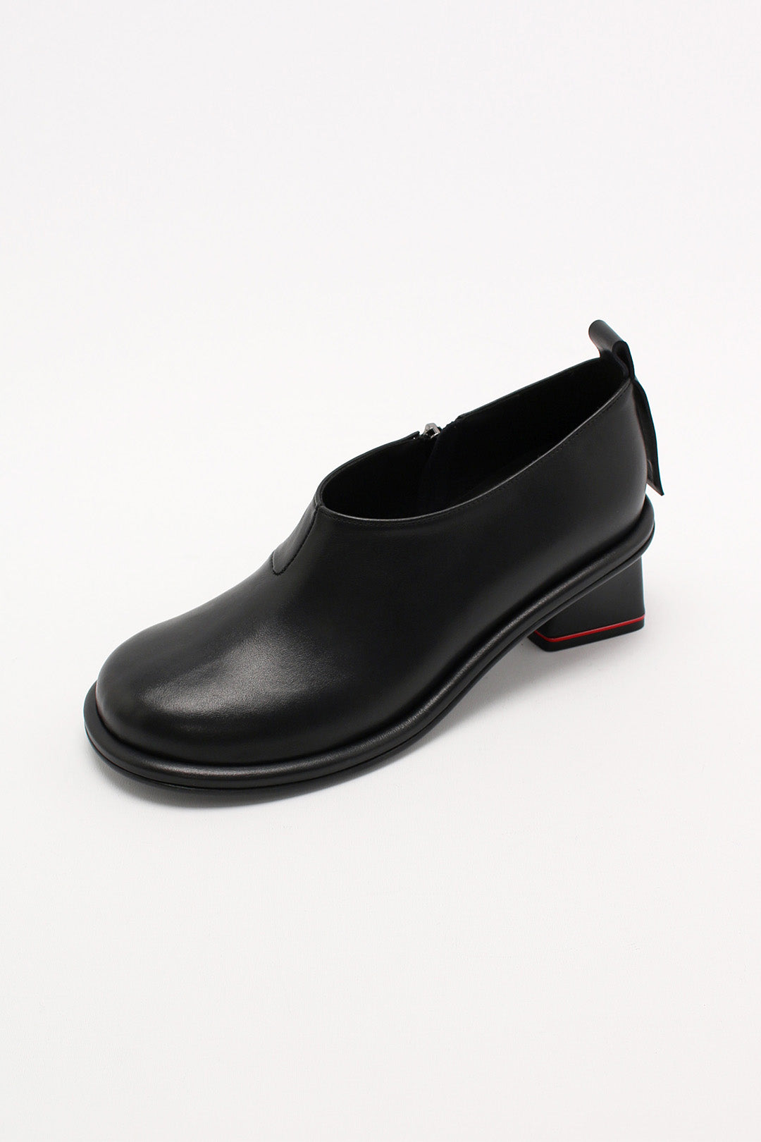 Black Moon Short Boots by Finoacinque featuring sleek leather design and chunky heels, perfect for stylish casual wear.