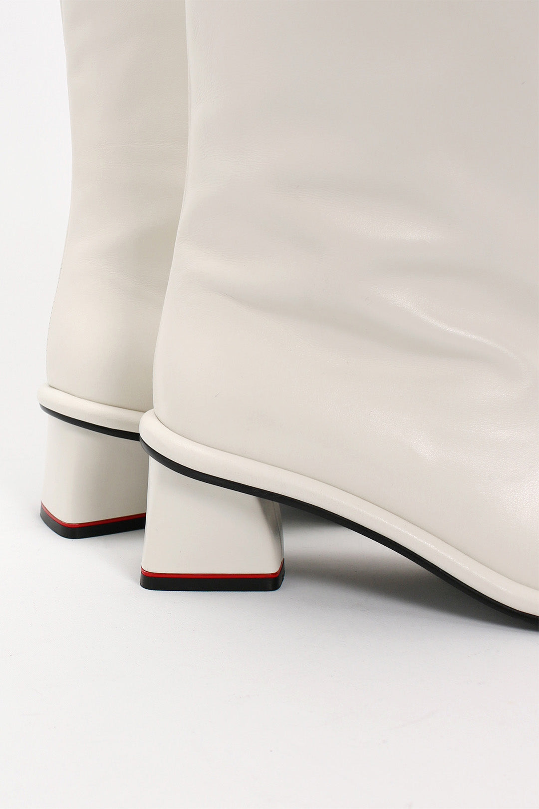 Finoacinque ivory Moon Long Boots showcasing tall, stylish boots with a sleek design and pointed toe.