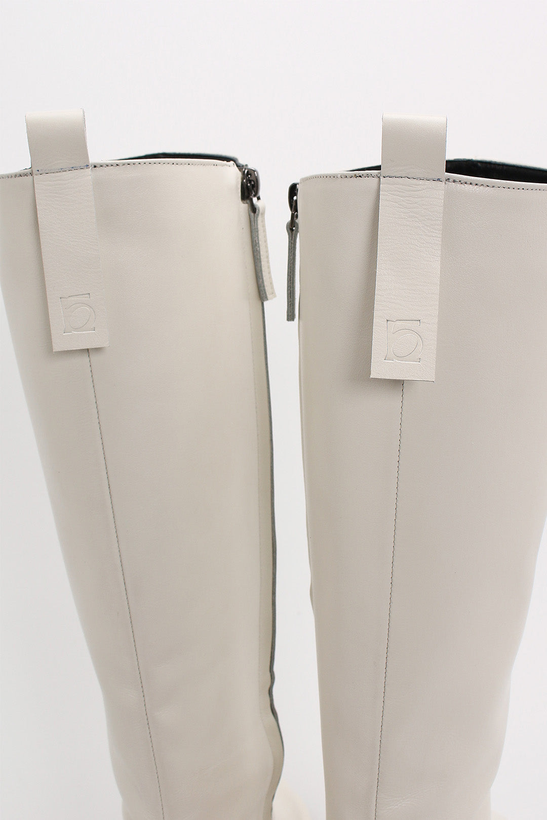 Ivory Moon Long Boots by Finoacinque featuring knee-high design, smooth leather finish, and sleek silhouette.