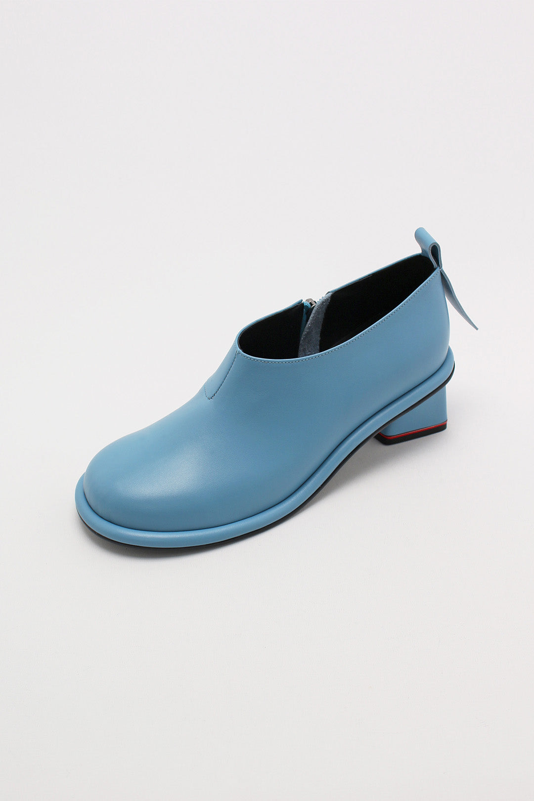 Light blue Moon short boots by Finoacinque, showcasing stylish ankle-length boots with a sleek design and textured finish.