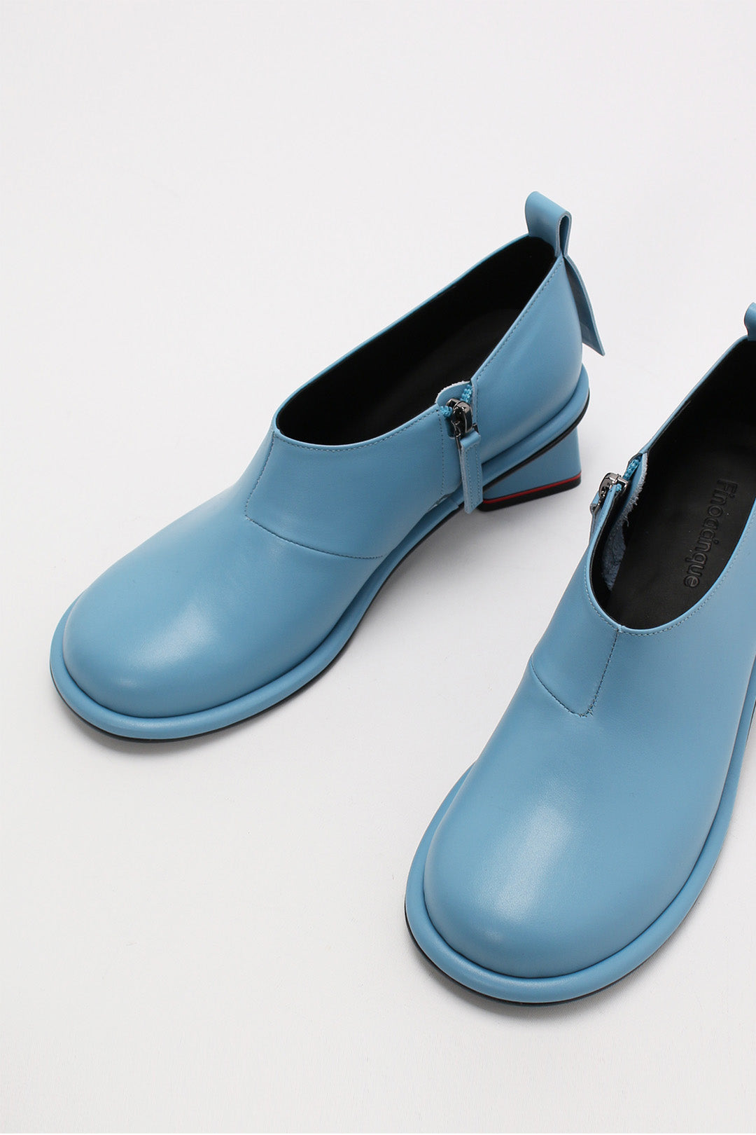 Light blue Finoacinque Moon Short Boots with sleek design and comfortable ankle height, perfect for casual wear.