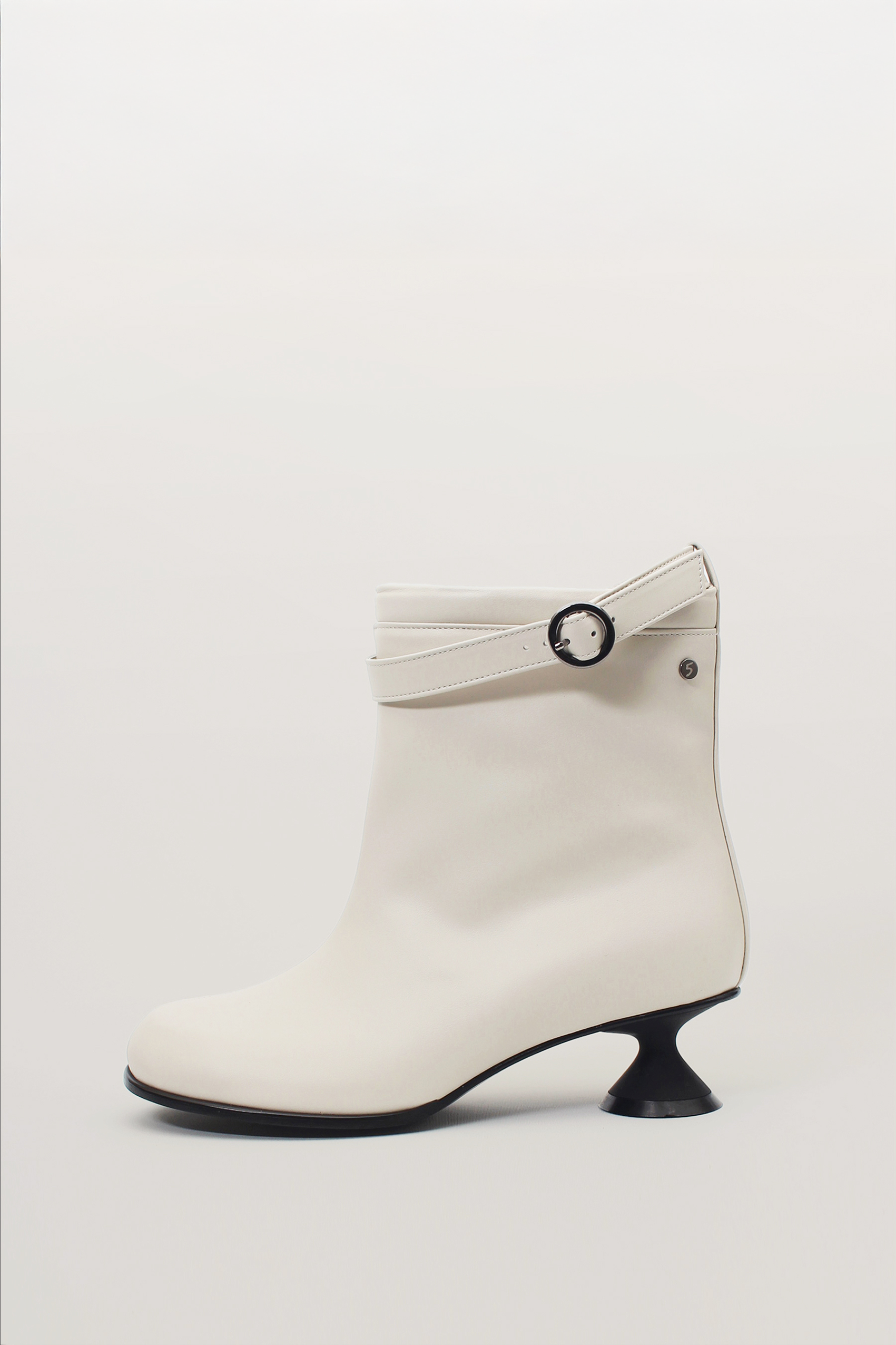 White Uhjeo Hourglass Middle Heel Strap Boots by Finoacinque with ankle straps and a sleek, modern design.