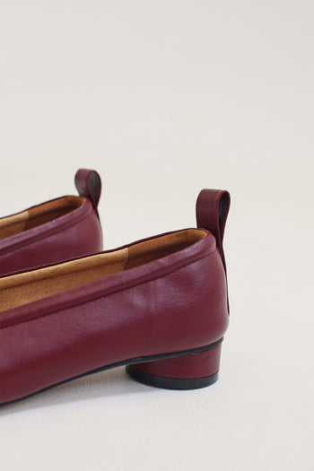 Finoacinque Ngela burgundy round toe stopper flat shoes with sleek design and comfortable flat sole.