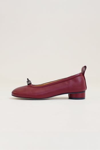 Finoacinque Ngela burgundy round toe stopper flat shoes with a sleek, minimalist design for everyday wear.