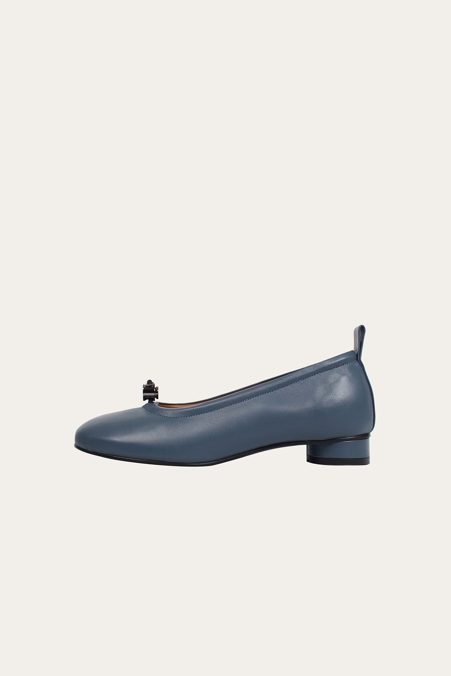 Finoacinque Ngela charcoal round toe stopper flat shoes for women, showing the sleek, minimalist design and matte finish.