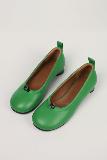 Green Ngela flat shoes by Finoacinque featuring round toe design and stopper detail, stylish and comfortable footwear.