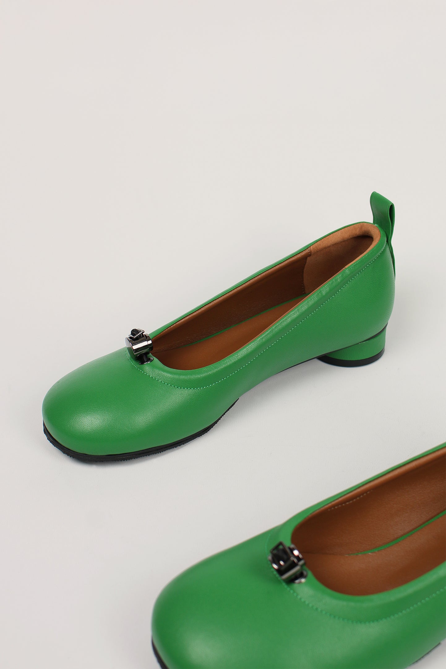 Green Finoacinque Ngela round toe stopper flat shoes with a sleek design and comfortable flat sole.