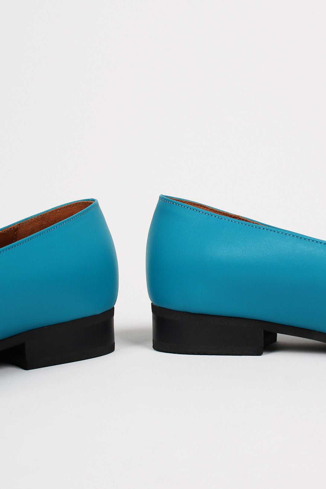 Turquoise IA Bow Ballerina flat shoes by Finoacinque featuring a sleek design and a decorative bow on the toe.