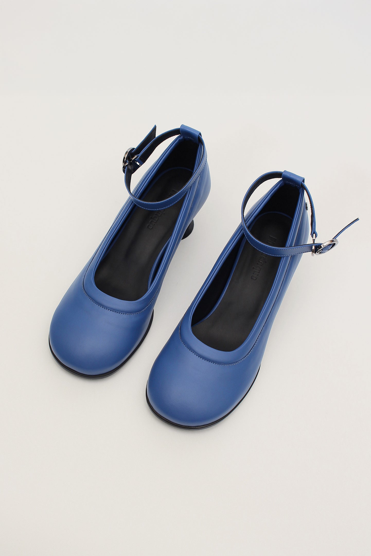 Finoacinque navy hourglass middle heel strap pumps with elegant design and open toe for stylish women’s footwear.